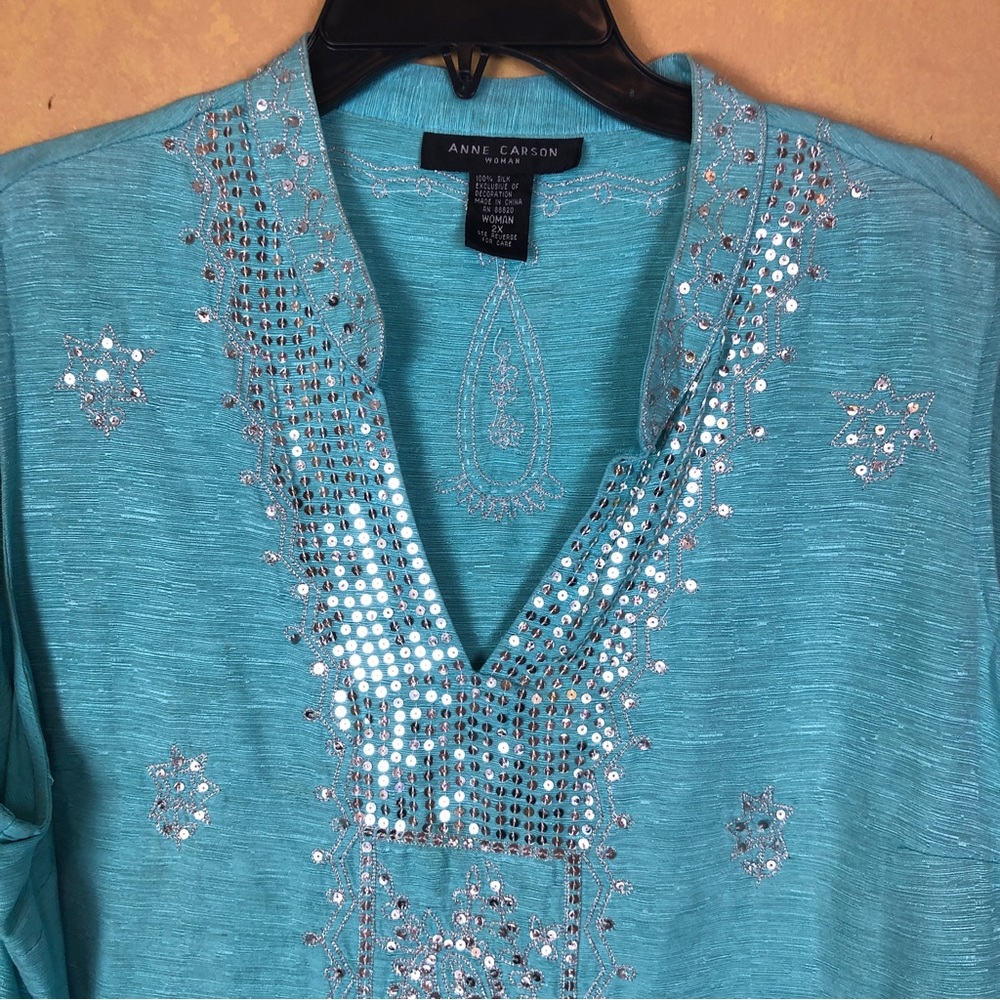 Woman’s blouse, size 2X, light blue, sleeveless